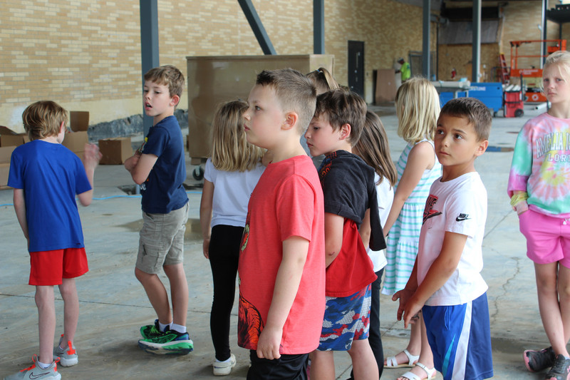 Photo of students touring inside the new school addition